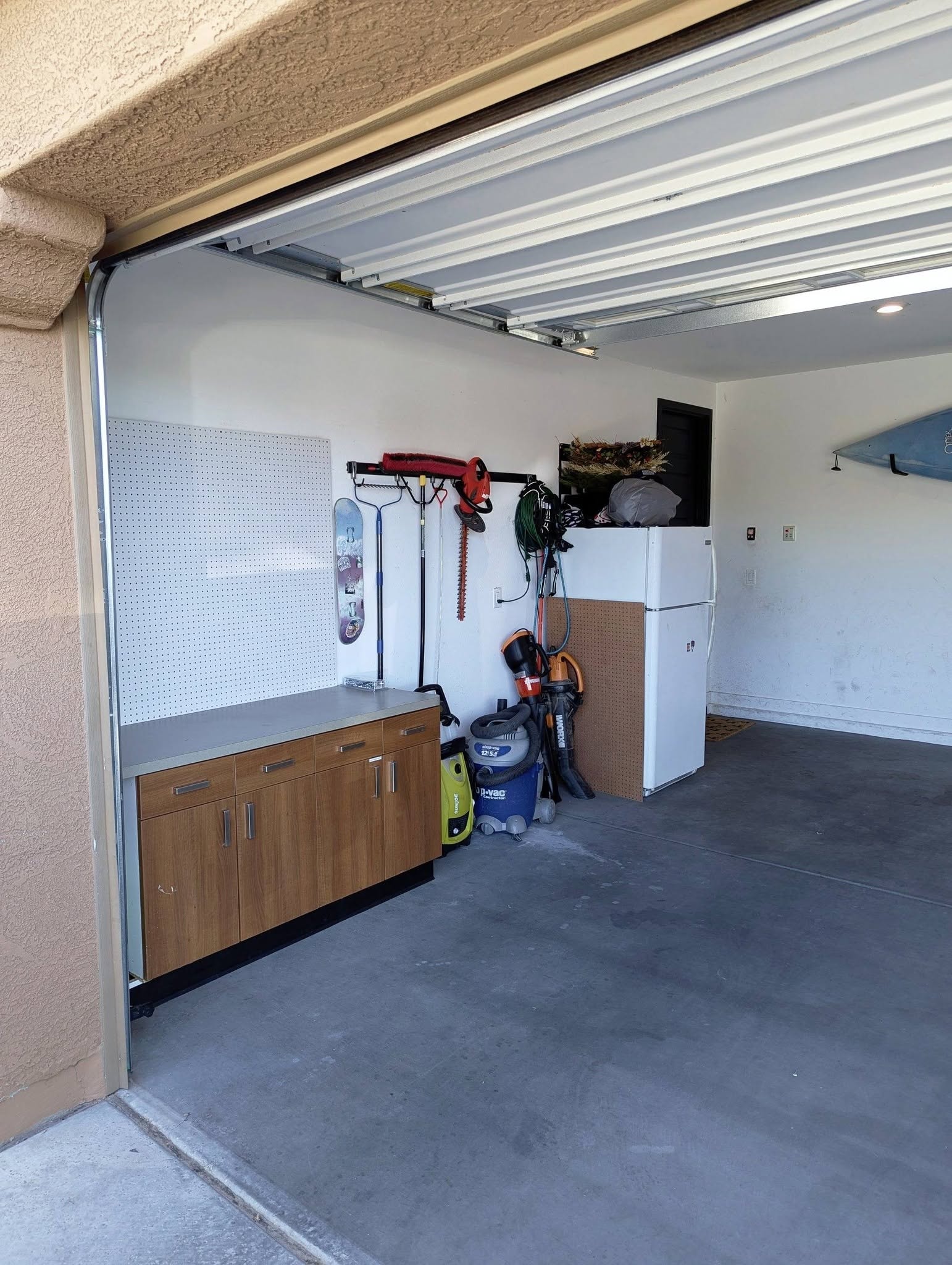 Organized garage workspace installation.