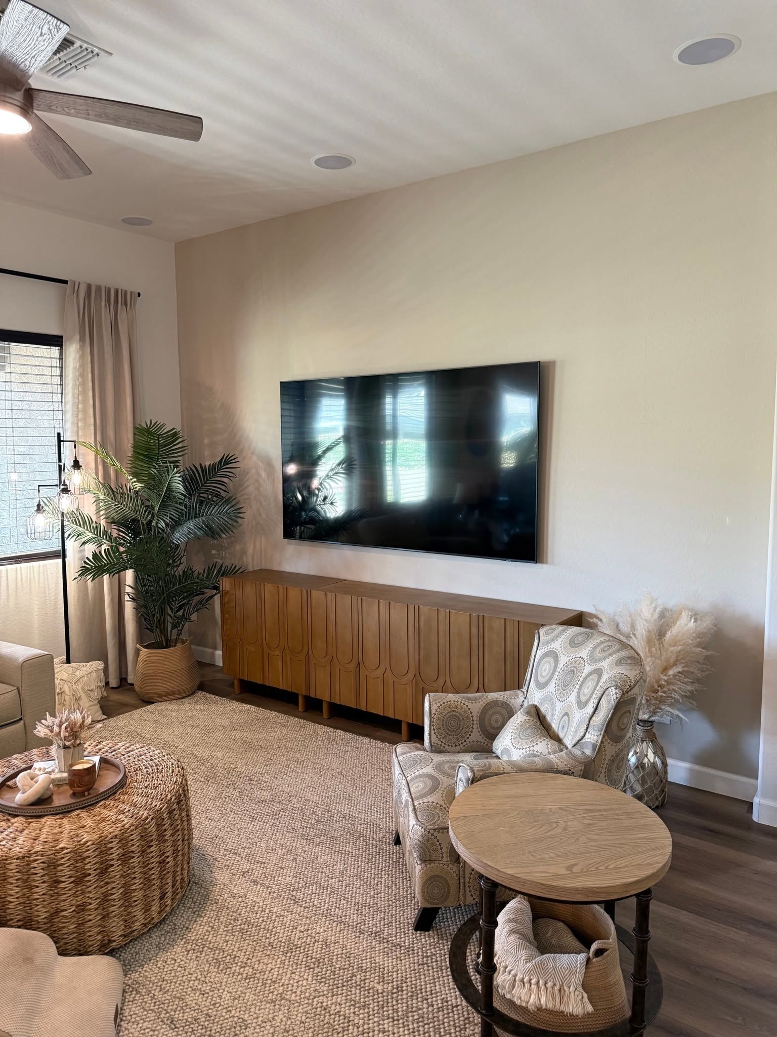 Secure wall-mounted television installation.