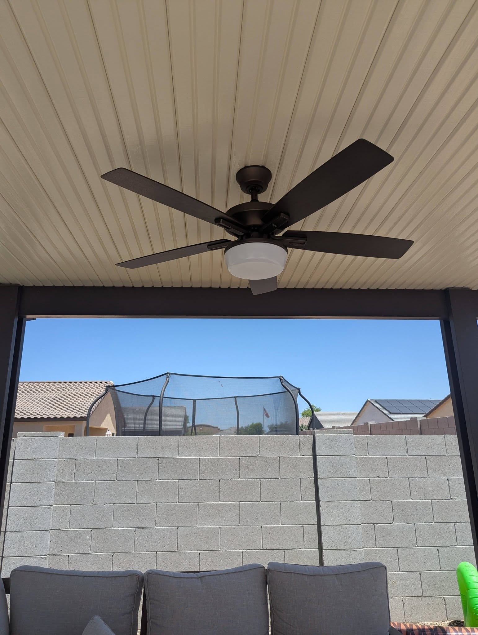 Outdoor ceiling fan installation.